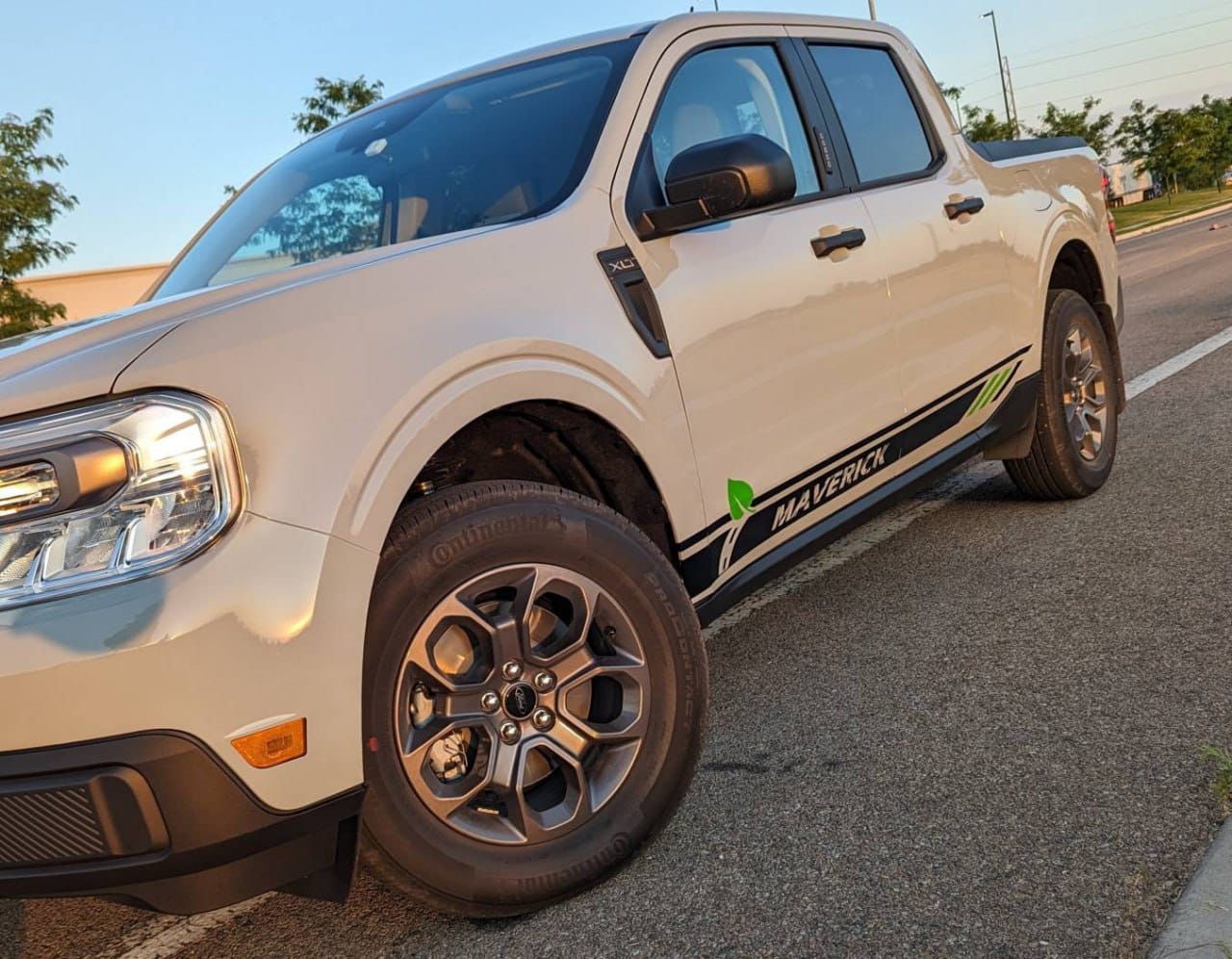 Ford Maverick truck with custom vinyl side stripes graphics installed by Brothers Graphics