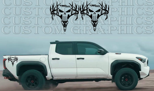 A white Toyota Tacoma truck with a custom decal design featuring a skull and crossbones on the side, part of a promotional image for a graphics company.