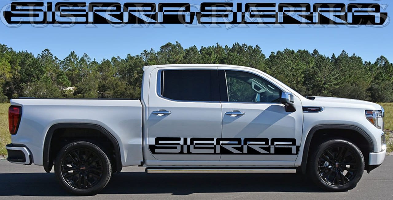 A white GMC Sierra truck with a die-cutting decal graphic on the side.