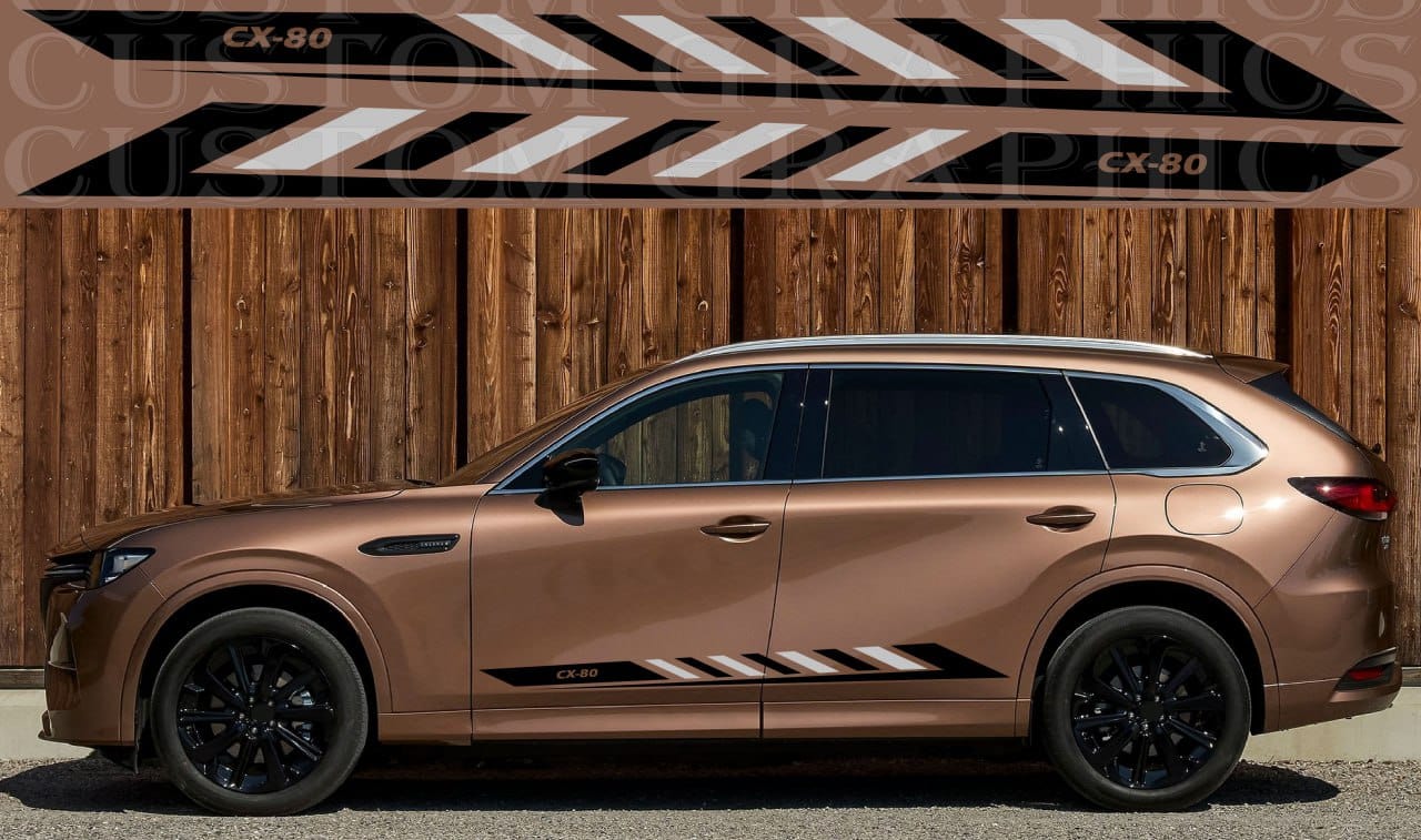 Bronze SUV with black accents parked against a wooden wall with 'CX-80' branding.