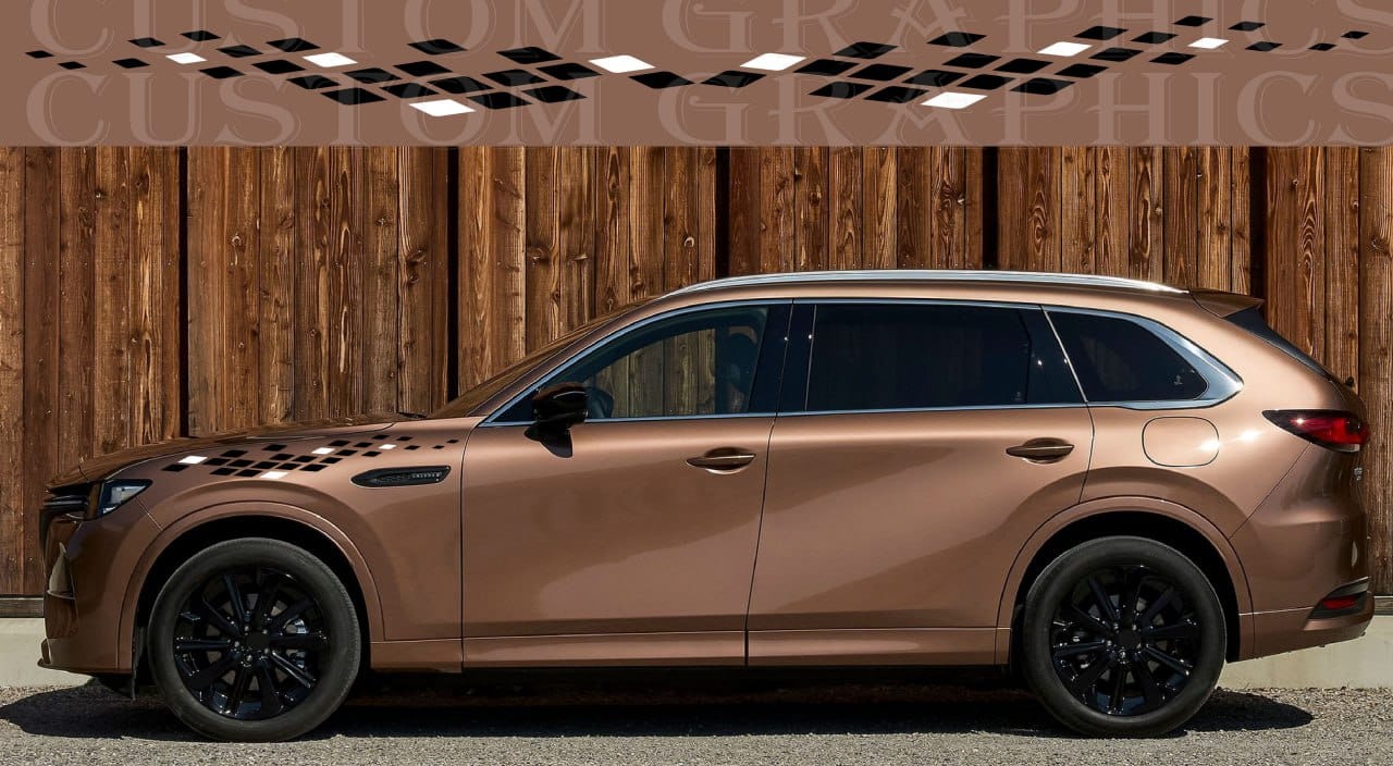 Bronze-colored SUV parked in front of a wooden wall with 'Custom Grille Customs' branding.