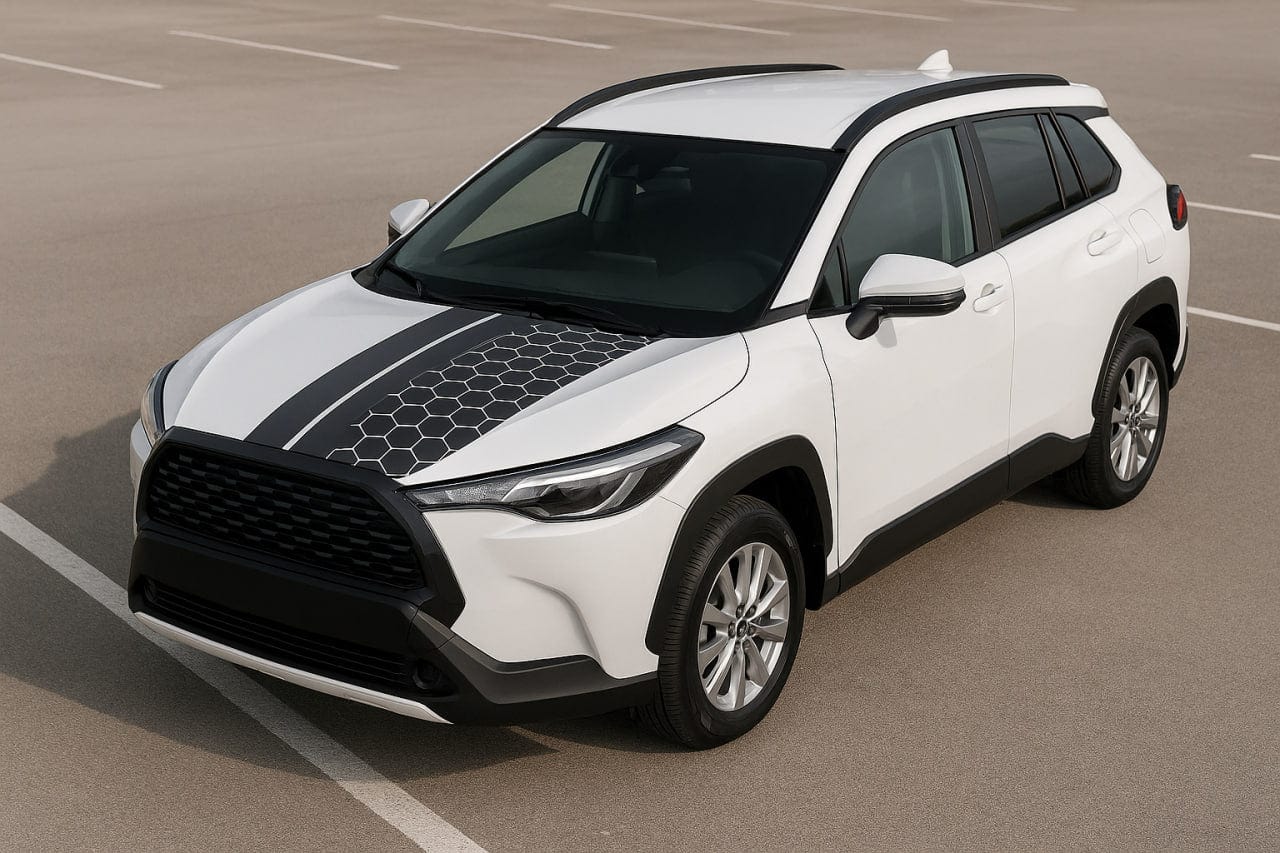 White SUV with black accents on a road