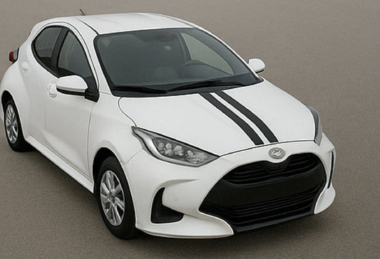 White car with black stripes on a gray background