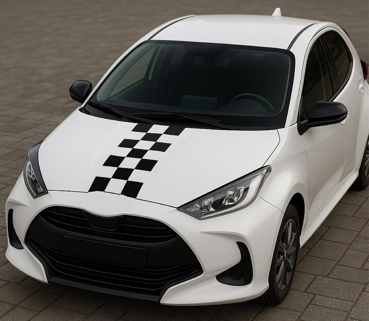 White car with black and white checkered design on a tiled floor