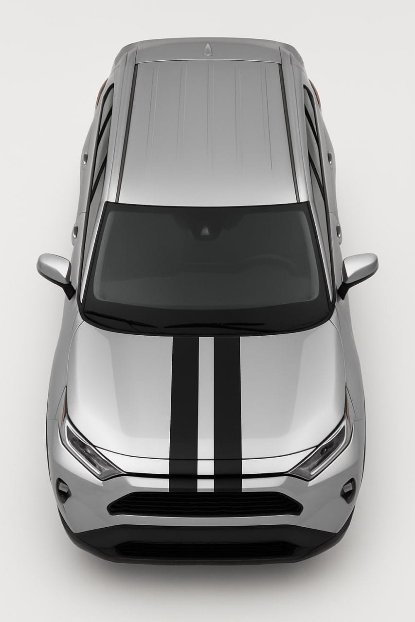 Top-down view of a silver car with black stripes on a white background