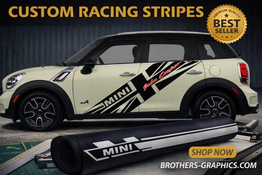 Mini Cooper car with custom racing stripes and a roll of vinyl graphics on a dark background.