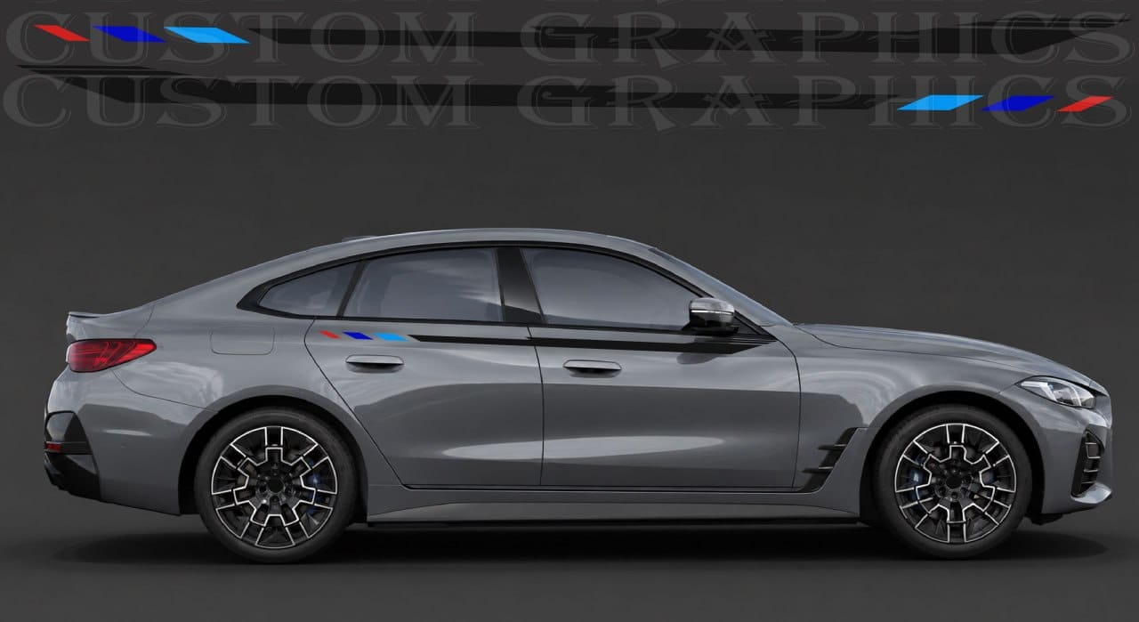 A side profile view of a gray BMW sedan with a custom blue and red M-style stripe decal running along the side window trim, set against a dark gray studio background with a 'Custom Graphics' watermark.