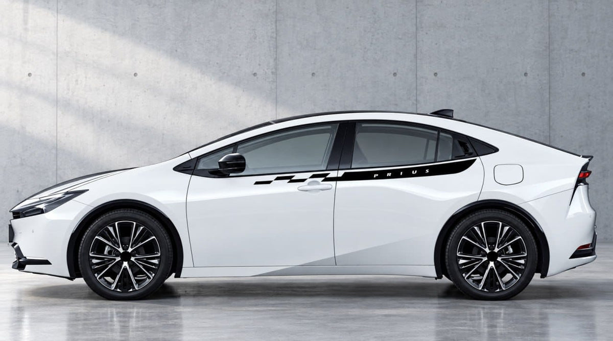A white modern sedan shown in a side profile view against a textured gray concrete wall and floor.